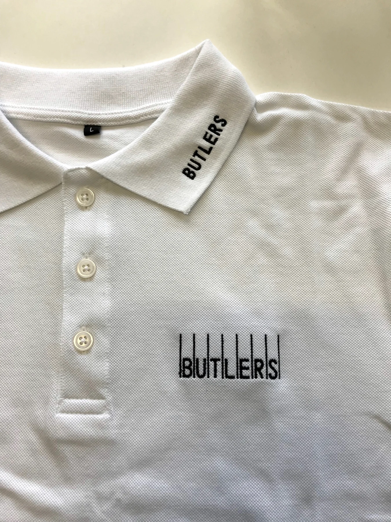 Fertiges weißes BUTLERS Polo-Shirt